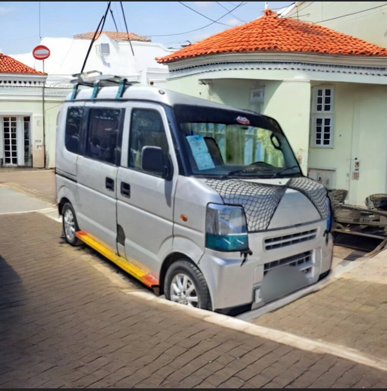 "2008 Suzuki Every DA64 in original factory condition, showcasing its tall boxy design and spacious interior, ideal for urban living and practicality."