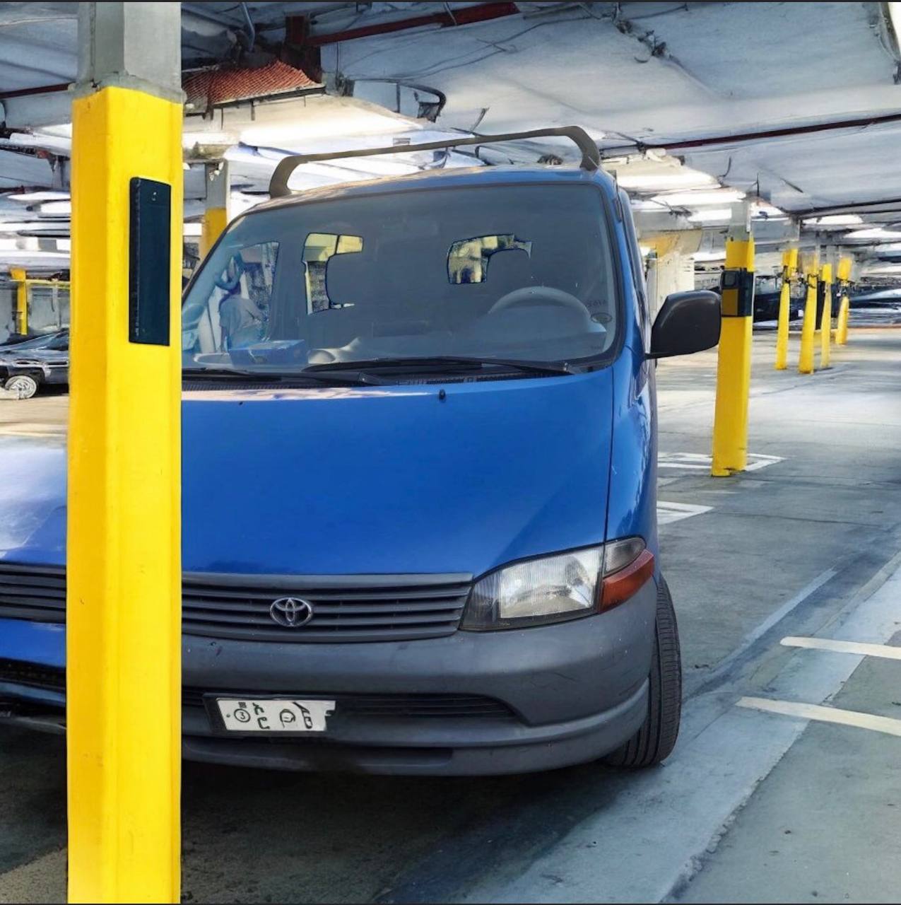 "2006 Toyota Granvia HiAce Crew Van in excellent condition, showcasing spacious interior, premium upholstery, and modern features, available for sale in Addis Ababa."