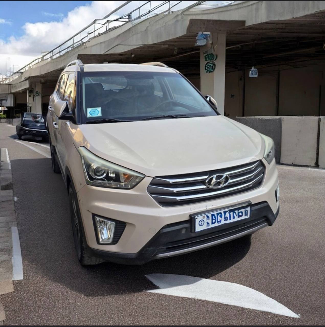 "2017 Hyundai Creta SUV in original factory color parked on a scenic street."