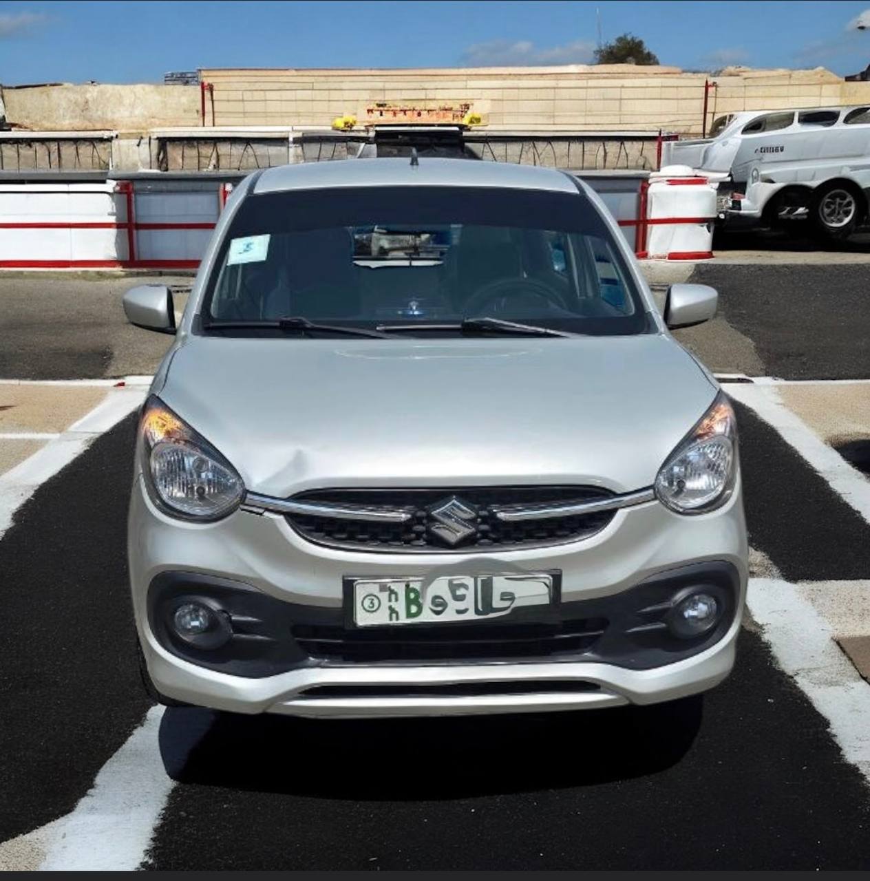 2022 Suzuki Celerio ZXi+ in a stylish urban setting.