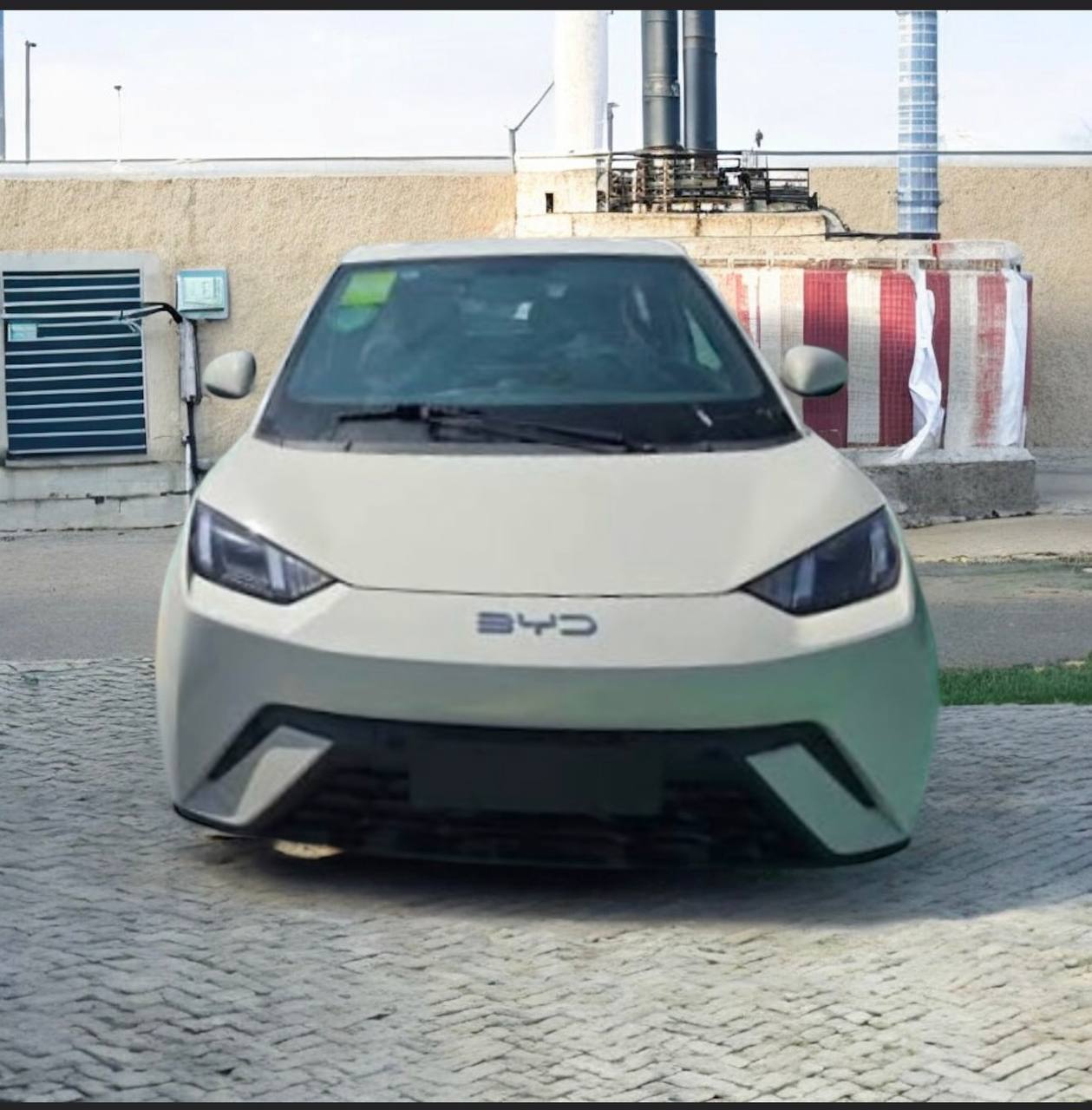 2025 BYD Seagull (EQ) Electric Car parked in an urban setting, showcasing its sleek design and modern features.