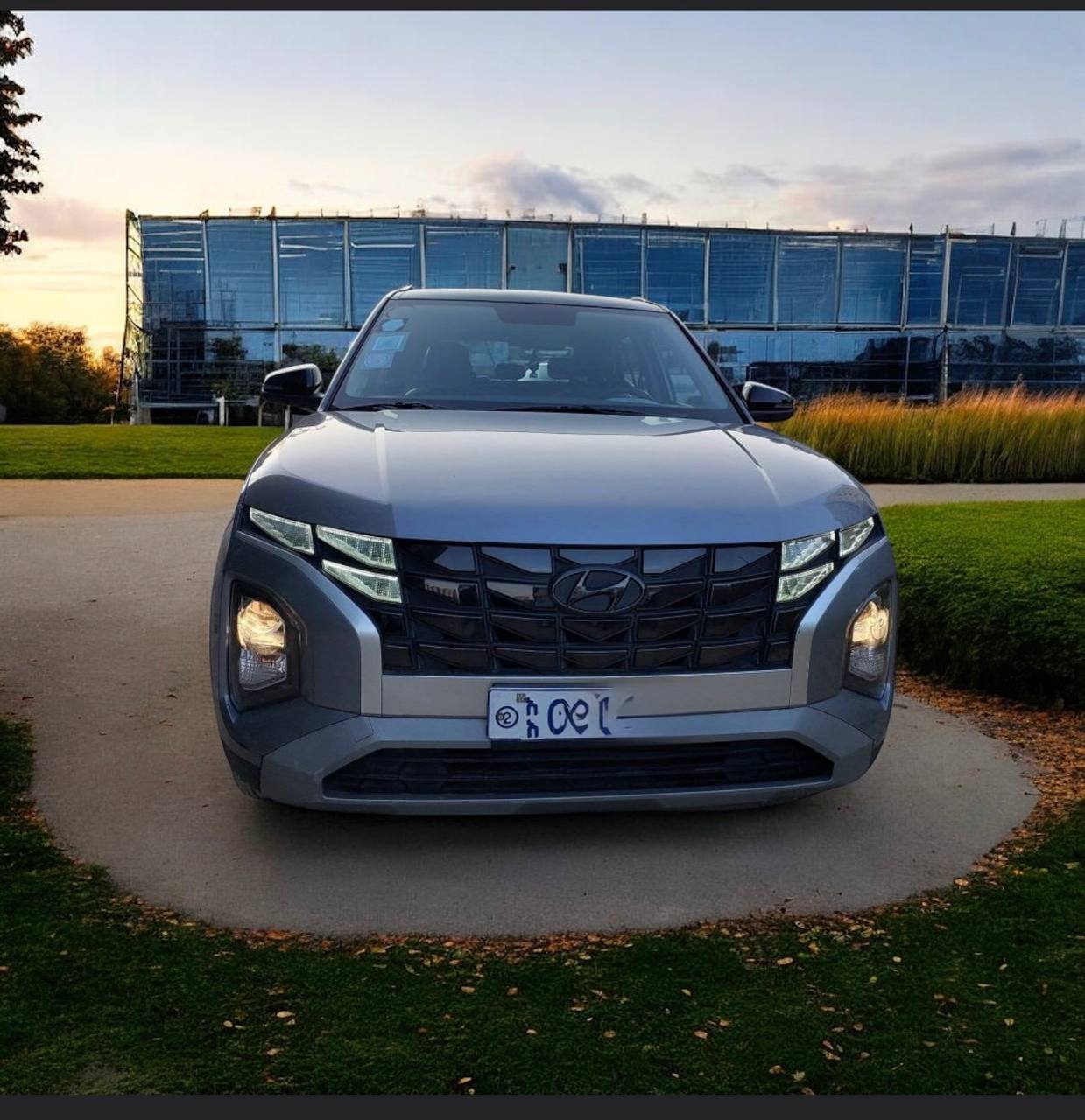Image of a pristine 2024 Hyundai Creta (SU2id) in a picturesque setting, showcasing its stylish design and modern features.