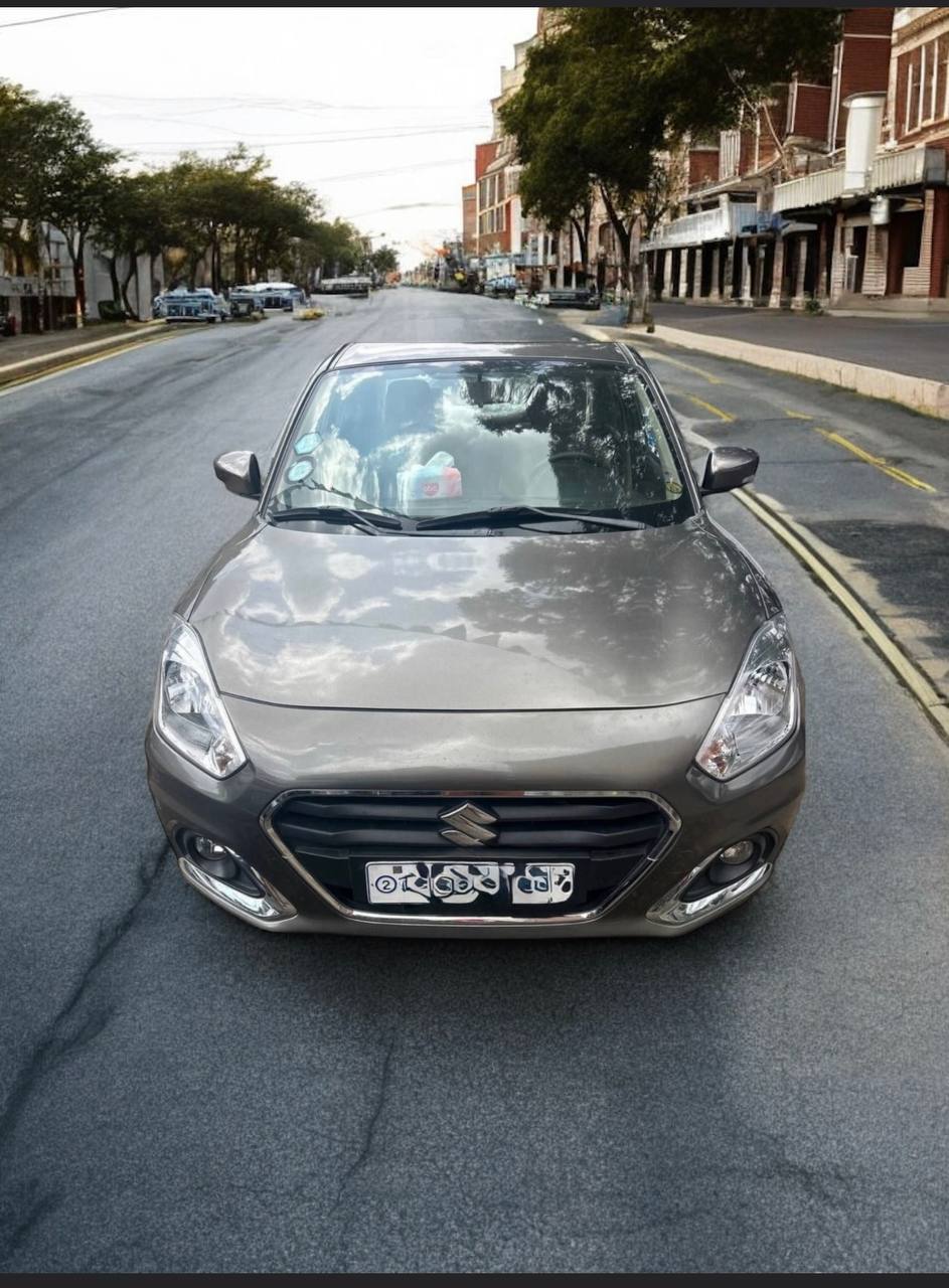 2023 Suzuki Dzire Subcompact Sedan in Saddle Brown Color