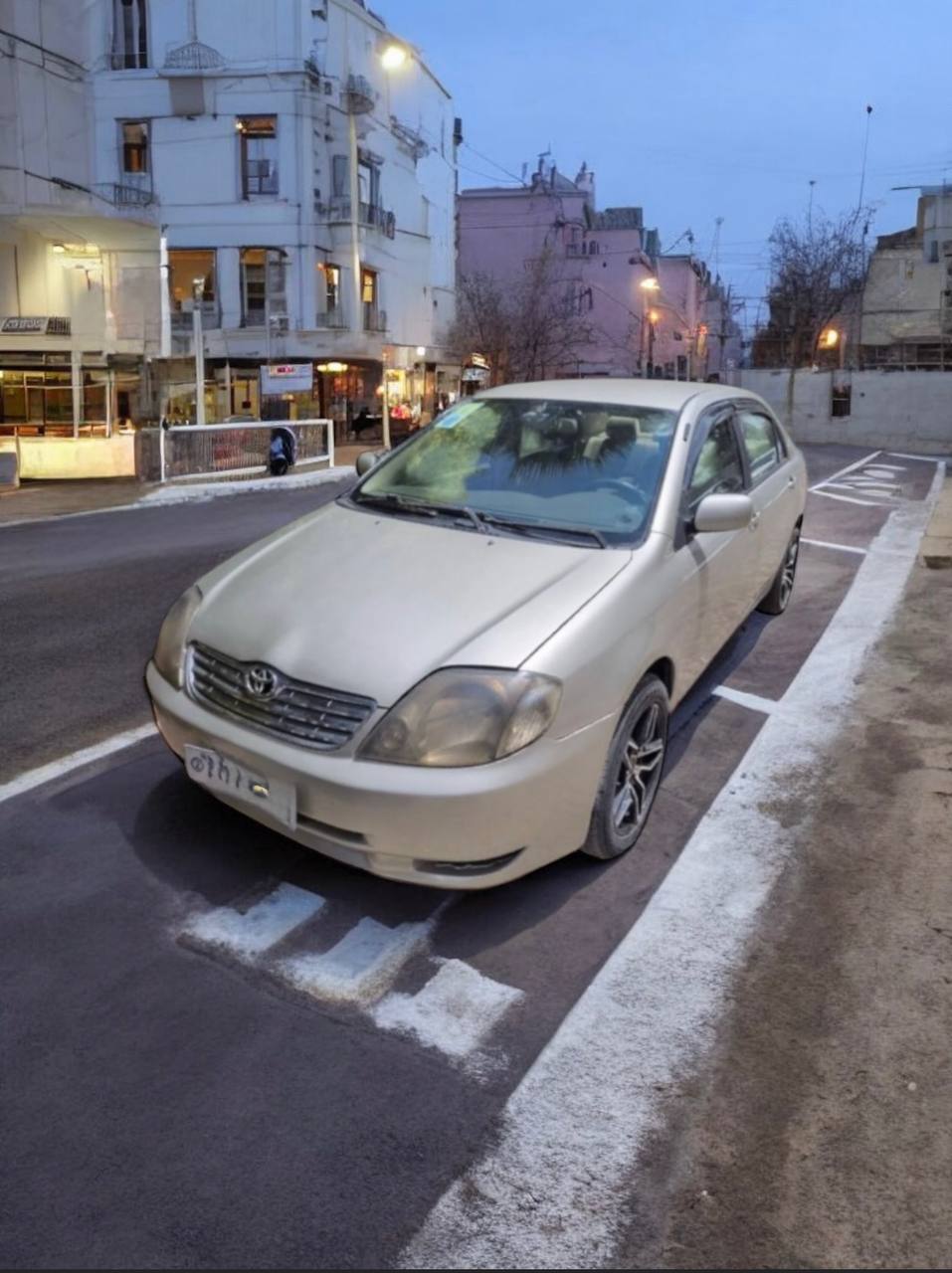 2001 Toyota Corolla XL Sedan in excellent condition for sale, showcasing its original color and features.