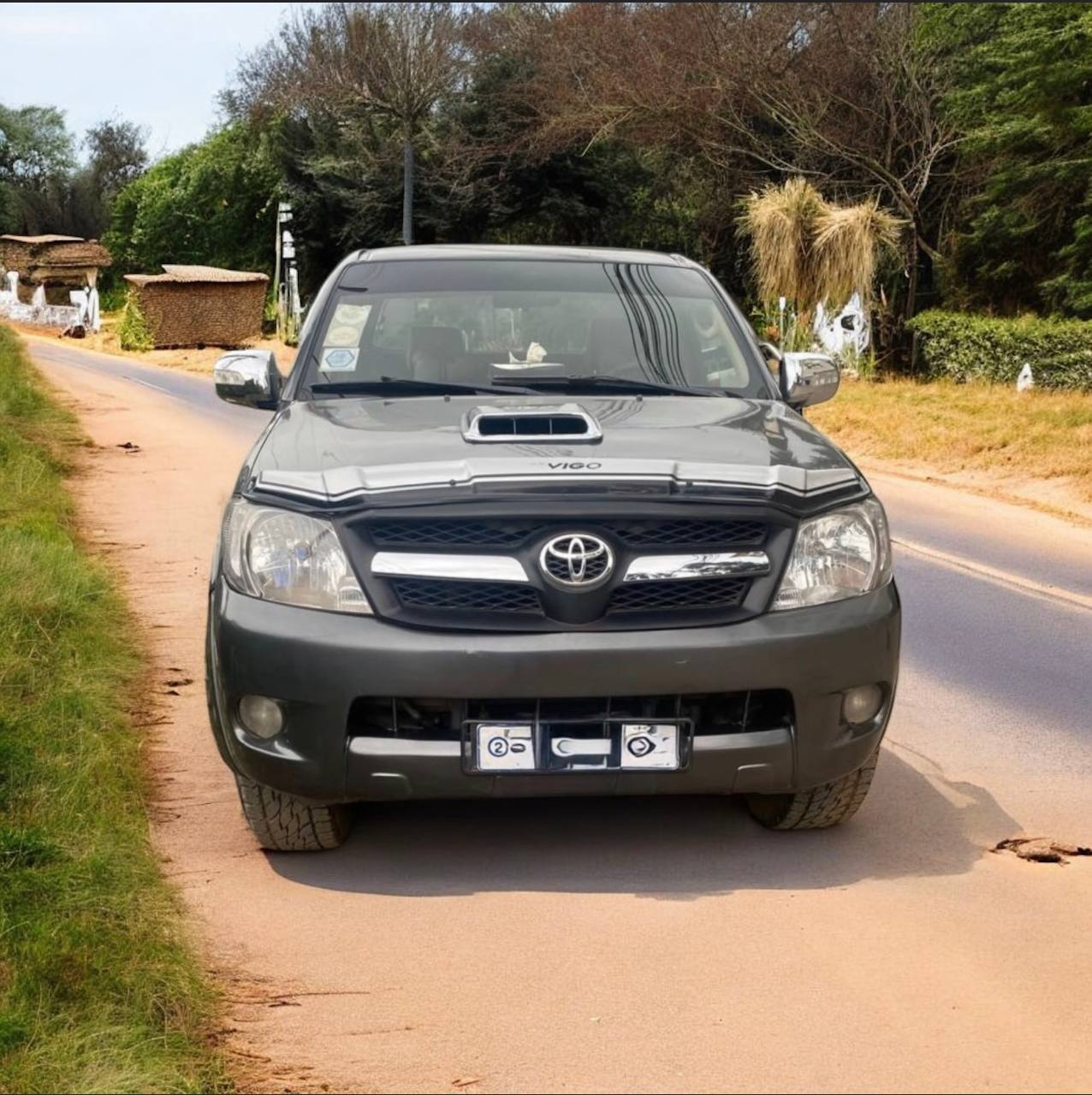 2009 Toyota Hilux Xtracab available for rent in Addis Ababa, showcasing a clean blue exterior and spacious interior
