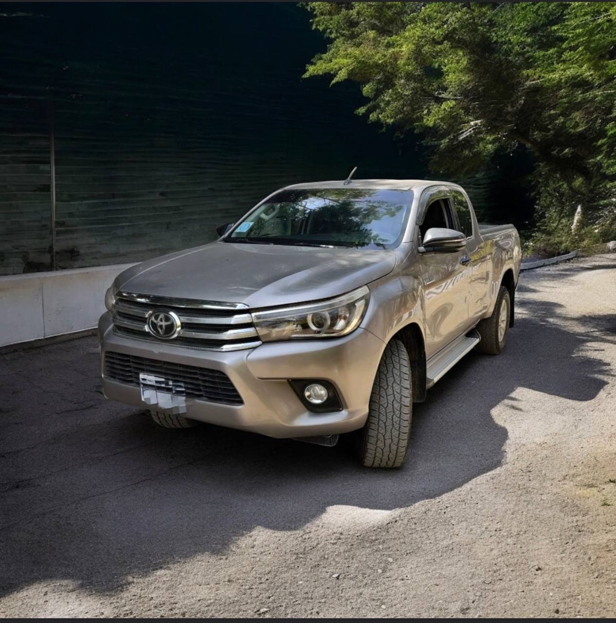 Front and side view of a white 2020 Toyota Hilux Ethiopia Revo Xtracab in Addis Ababa showroom condition.