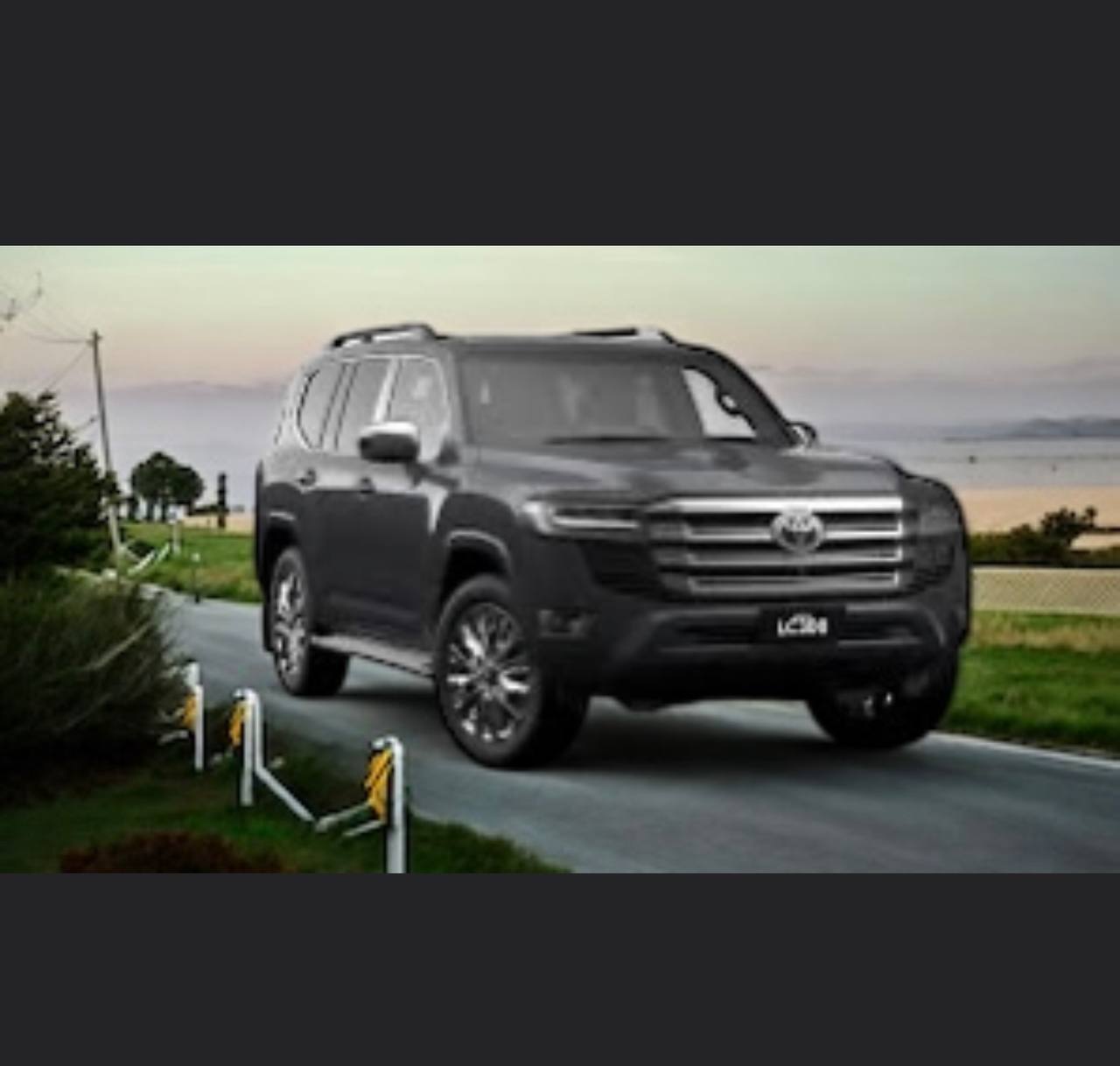 2025 Toyota Land Cruiser (J300) Hybrid parked in an outdoor setting with mountains in the background.