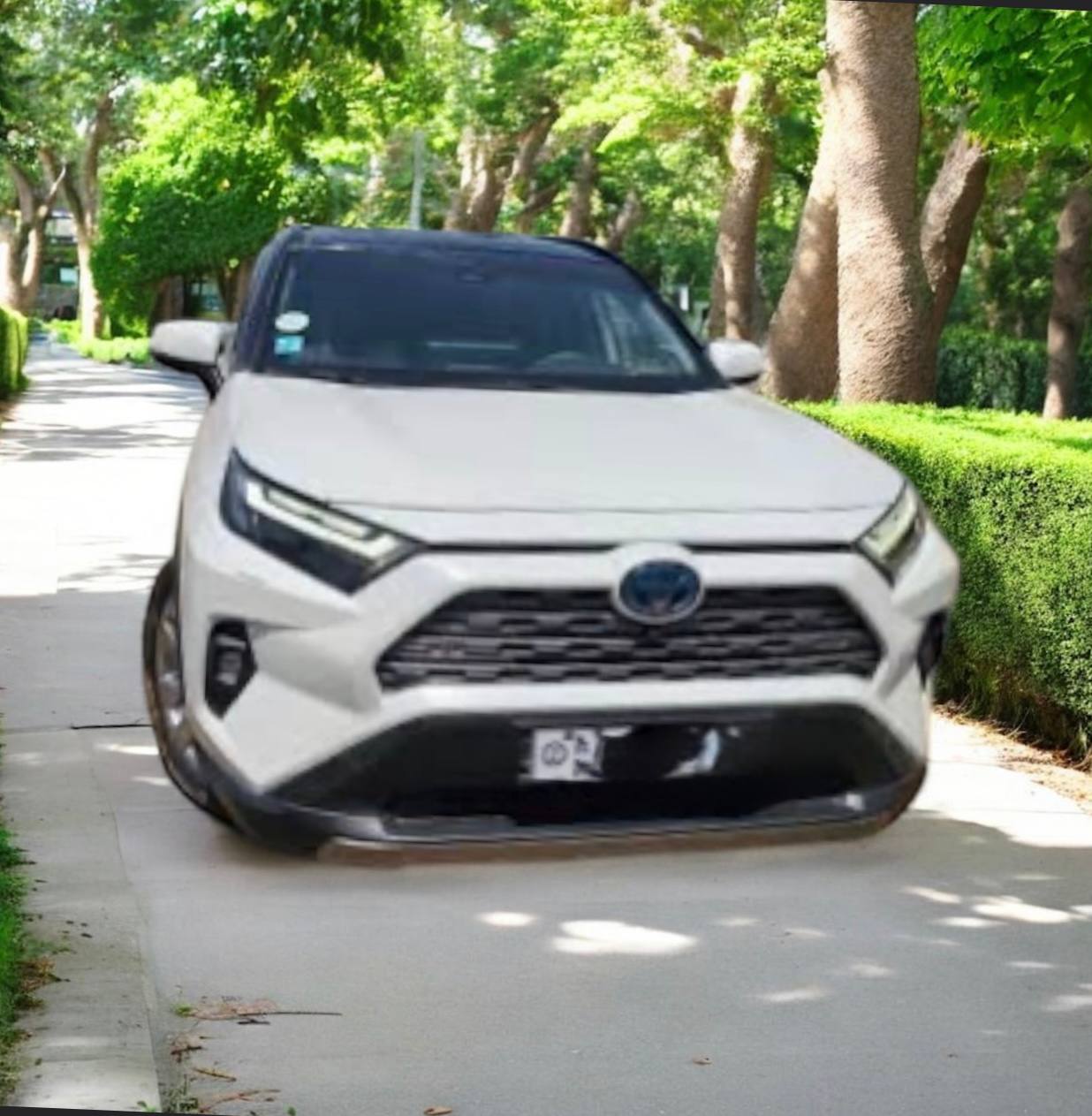 2023 Toyota RAV4 XA50 in excellent factory condition parked outdoors.