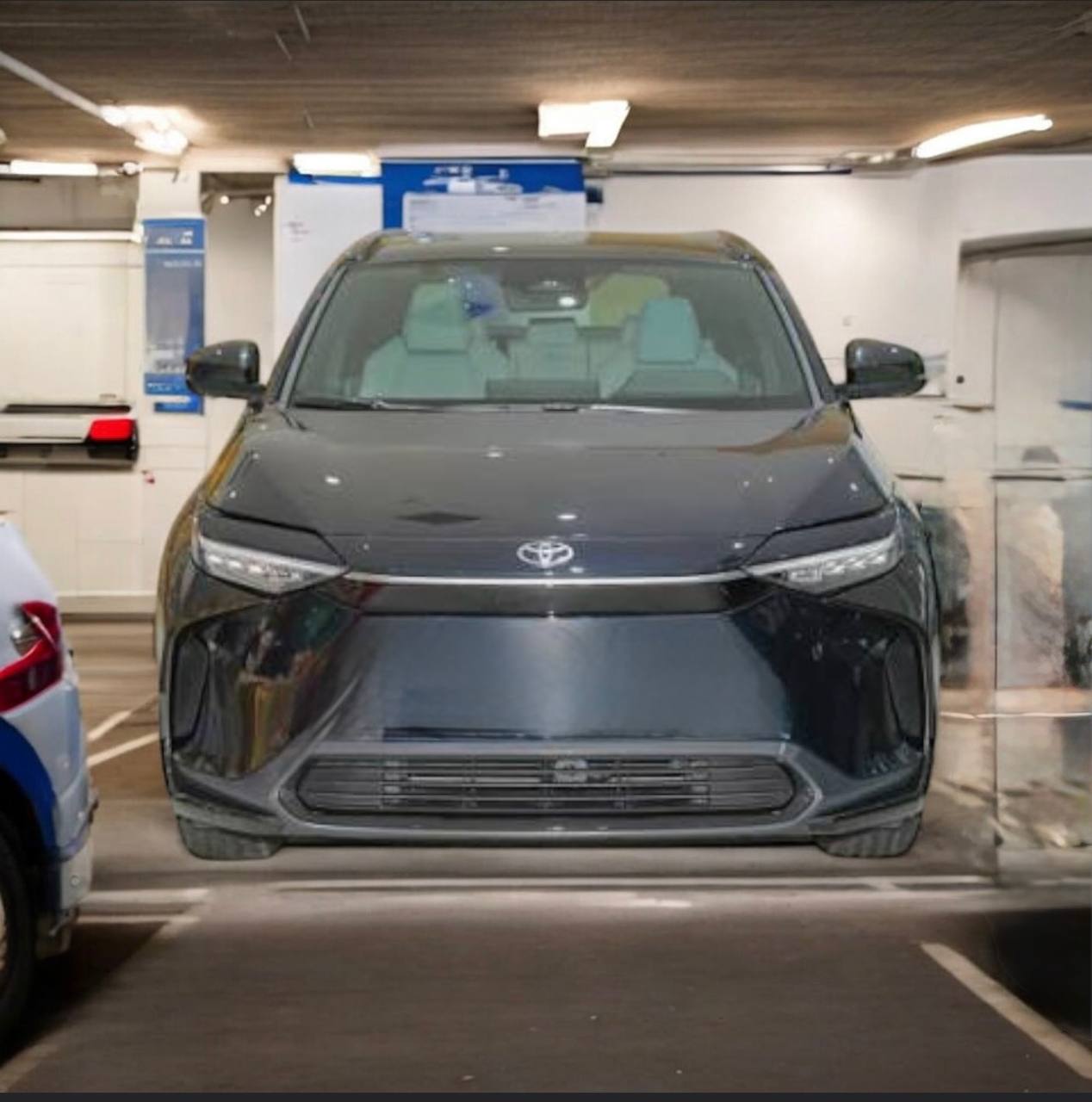 2024 Toyota bZ4X in sleek black, showcasing its modern design and high-tech features.