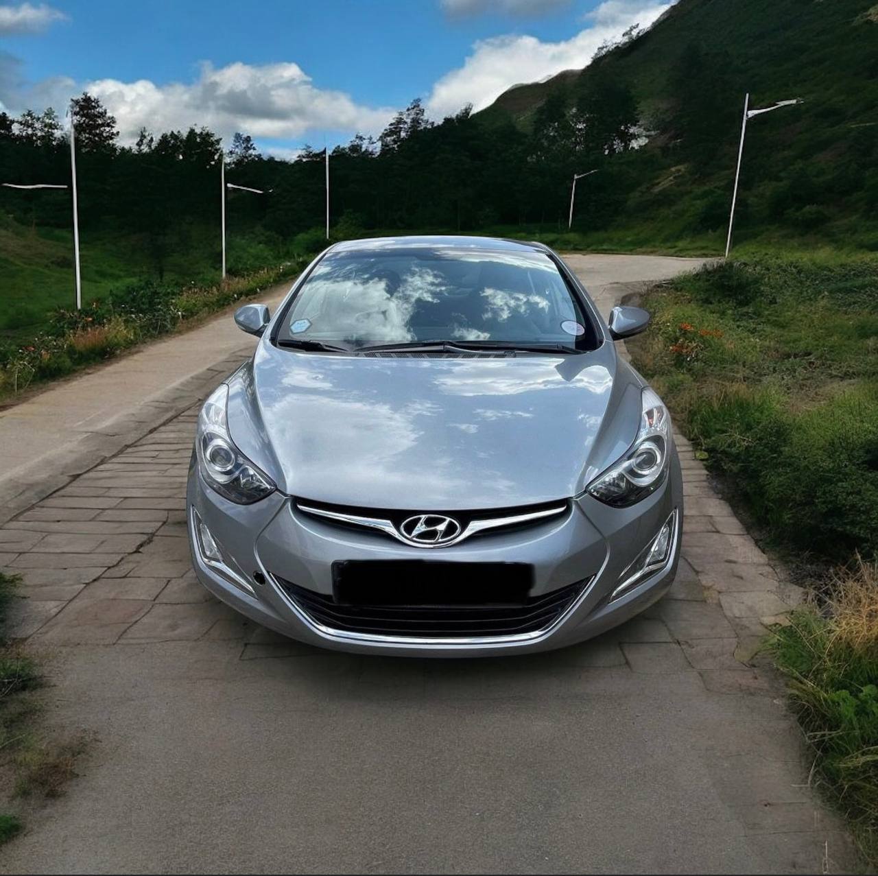 2012 Hyundai Avante sedan for sale, showcasing its sleek design and excellent condition.