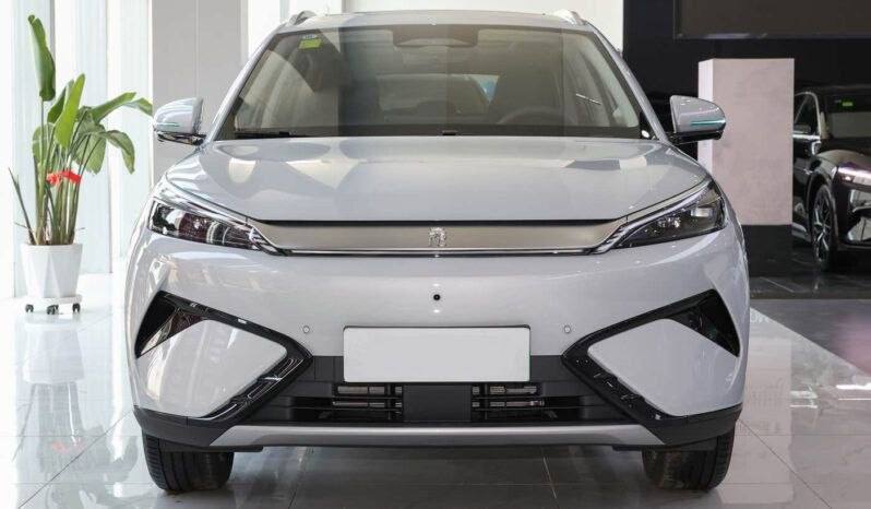 Blue 2025 BYD Atto 3 electric SUV driving on the streets of Addis Ababa Ethiopia