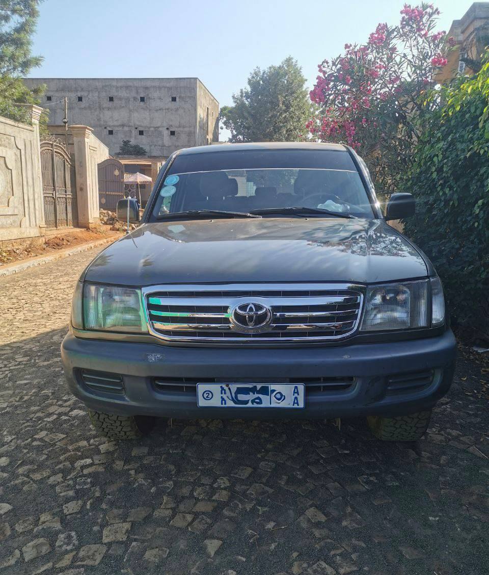 2003 Toyota Land Cruiser J105 for rent in Addis Ababa Ethiopia Interior of Land Cruiser J105 Rental showing 8-passenger seating and modern dash.