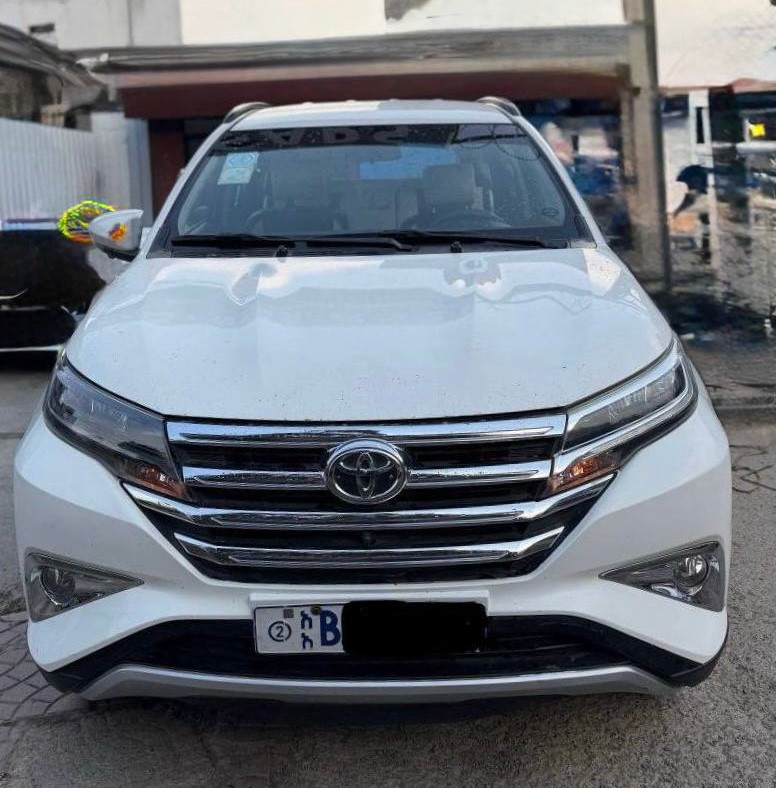 2021 Toyota Rush SUV parked in Addis Ababa, showing LED headlights and 17-inch alloy wheels.