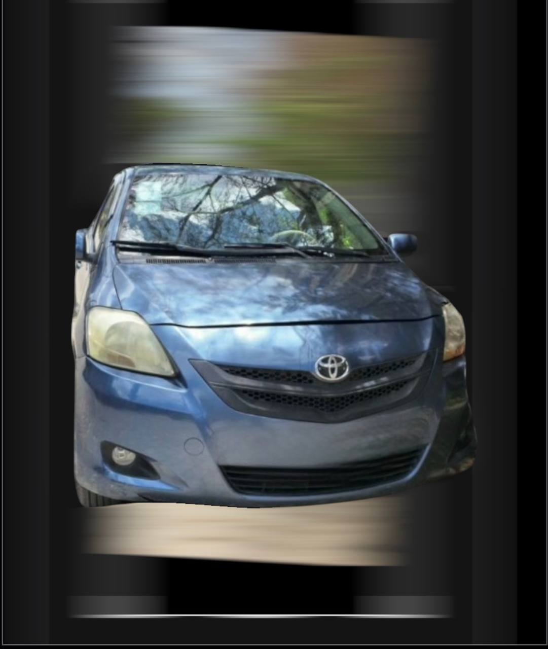 Toyota Yaris 2007 Ethiopia blue-grey metallic exterior view.