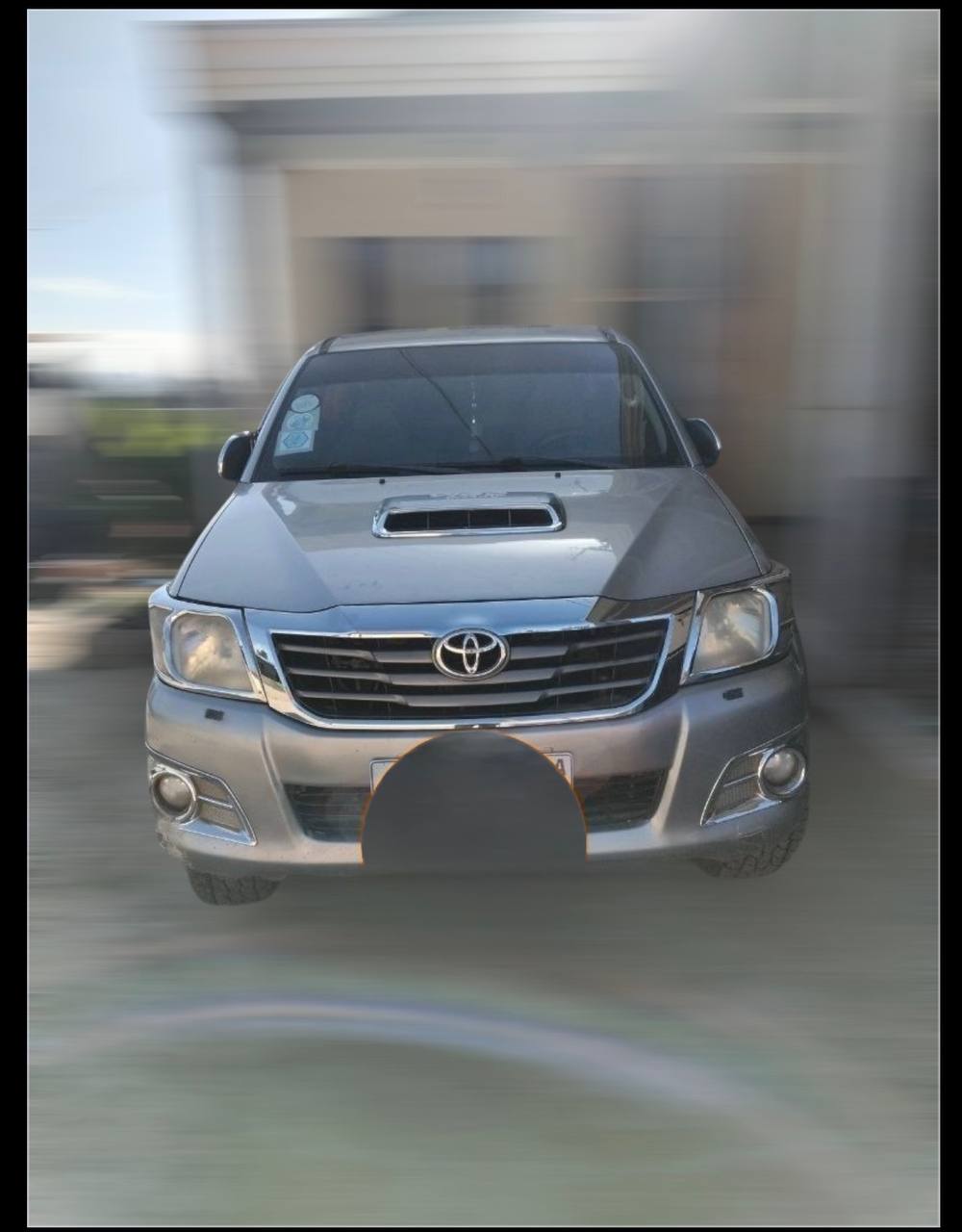 2014 Toyota Hilux Vigo Price in Ethiopia - Metallic Saddle Brown 4x4 Extra Cab for Sale in Addis Ababa.