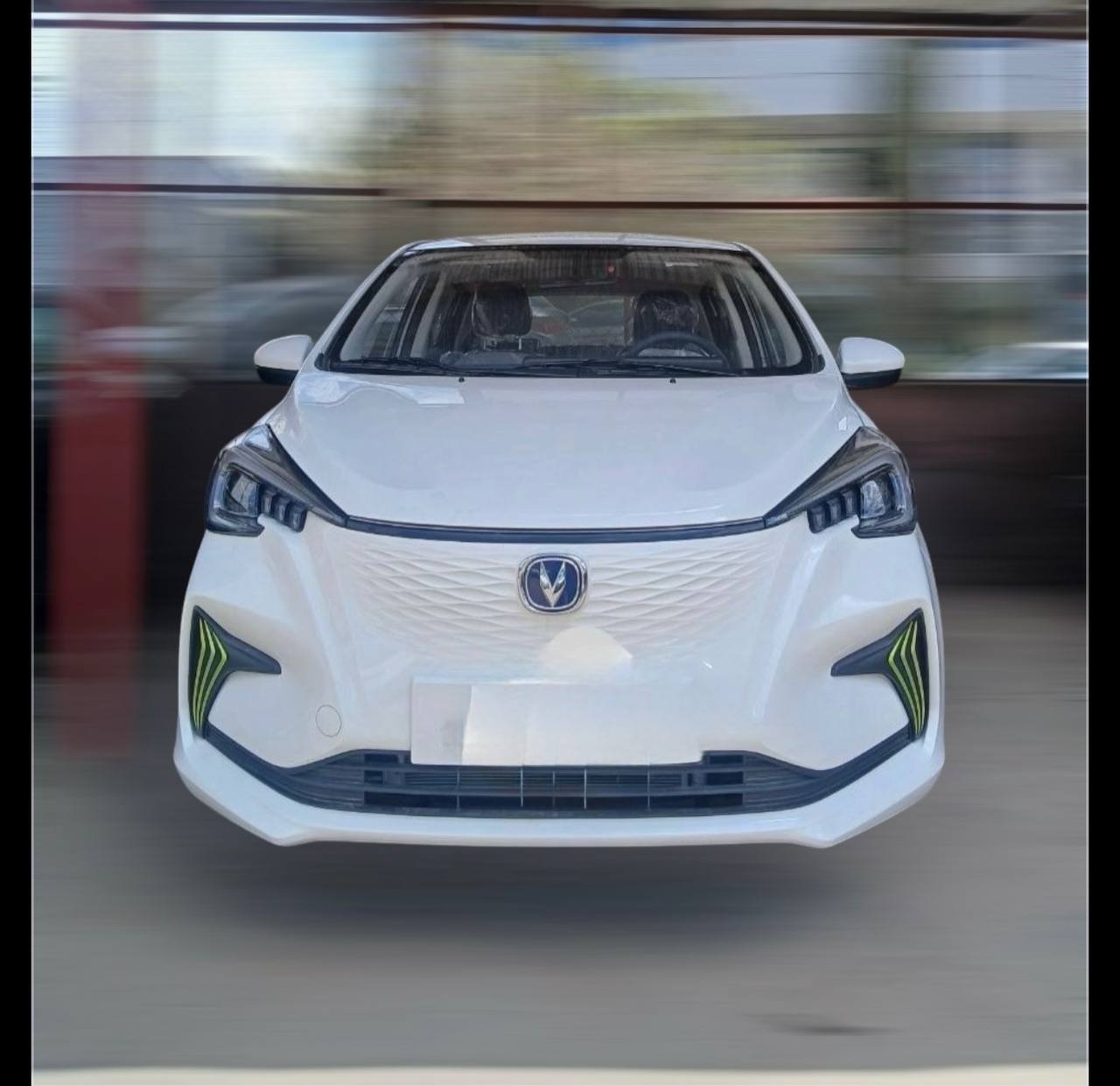 White Changan Benben E-Star electric car front view on display