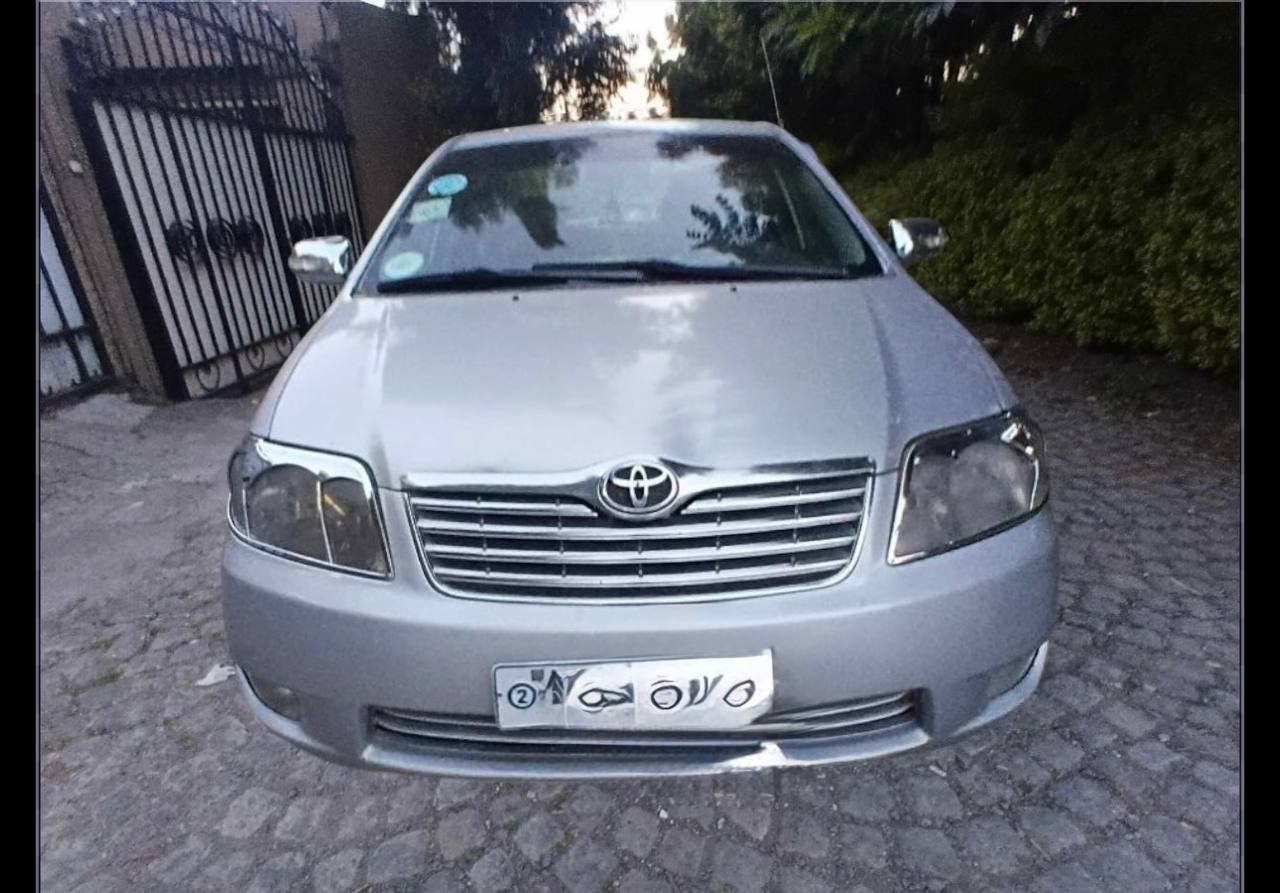 Front profile of a silver 2007 Toyota Corolla XL sedan for sale on megebeya