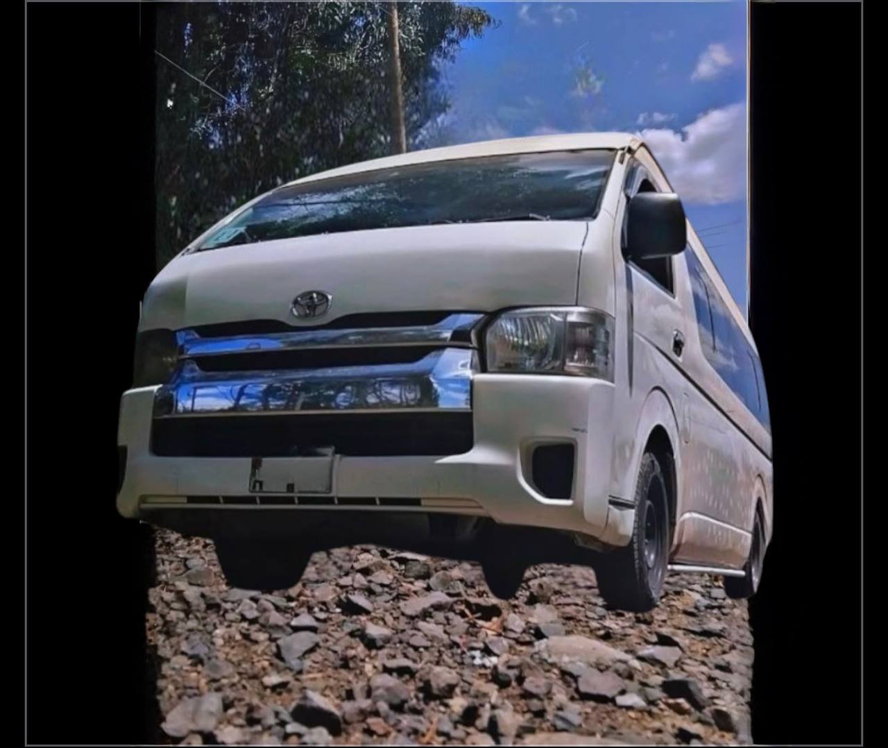 White 2017 Toyota HiAce H200 commercial cargo van parked showcase side view