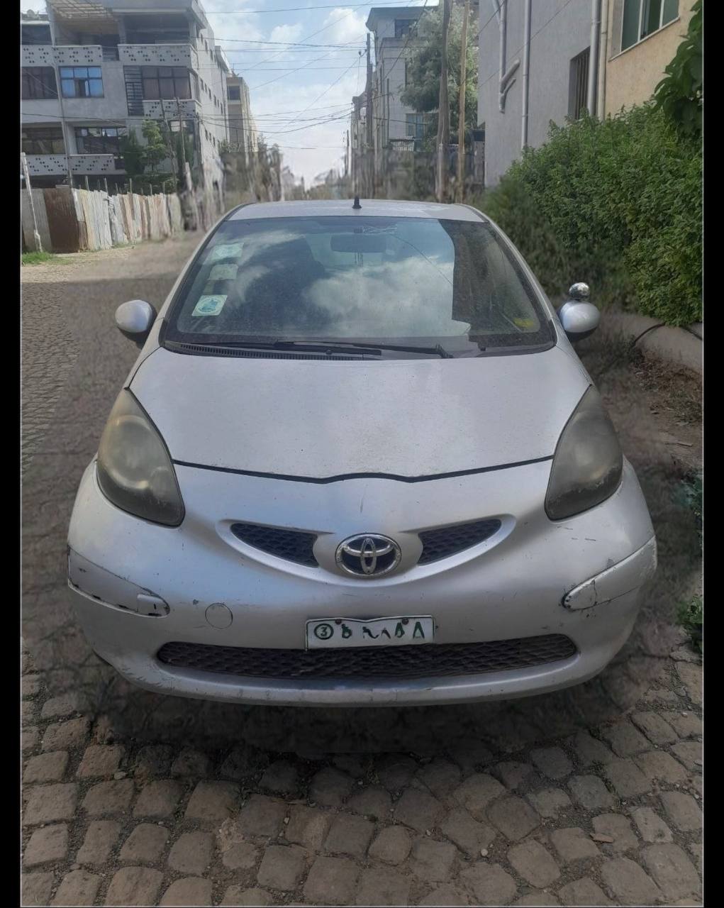 Toyota Aygo Addis Ababa front profile view highlighting the custom factory pea green paint finish